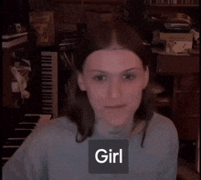 a woman 's face is shown with the word girl in a square