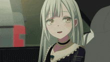a girl with long white hair is sitting in a car