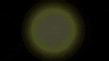 a yellow circle with a black background is glowing