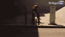 a skateboarder is doing a trick on the sidewalk with the hashtag ig : rigoh
