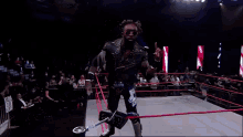 a wrestler in a ring with a sign that says i love you on it