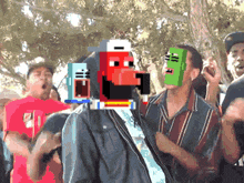 a man wearing a red hat and a green mask stands in front of a crowd