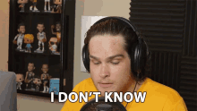 a man wearing headphones says " i don 't know "