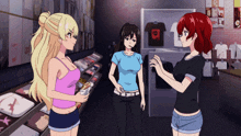 a girl in a pink tank top is talking to another girl