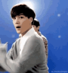 a man with a surprised look on his face is dancing