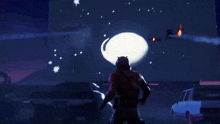 a person standing in front of a large explosion