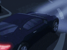 a dark blue car is parked in a parking lot