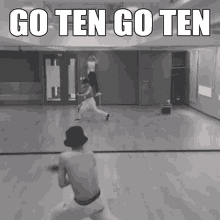 a black and white photo with the words go ten go ten on the bottom