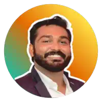a man with a beard is smiling in a circle with a colorful background