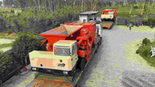 an aerial view of a truck carrying a machine that says ' india ' on it