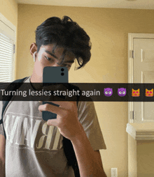 a man taking a picture of himself with a caption that says turning lessies straight again
