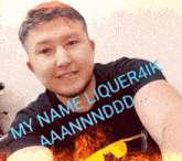 a man wearing a black shirt that says my name liquer4k