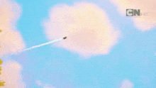 a cartoon character is flying through the air with cn written on the bottom of the screen