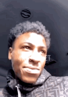nba youngboy rapper chewing smile kiss