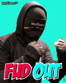 a man wearing a black hoodie and a multivers hat
