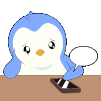 a penguin is sitting at a table looking at a cell phone with a speech bubble