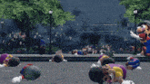 a group of mario and luigi dolls are laying on the ground
