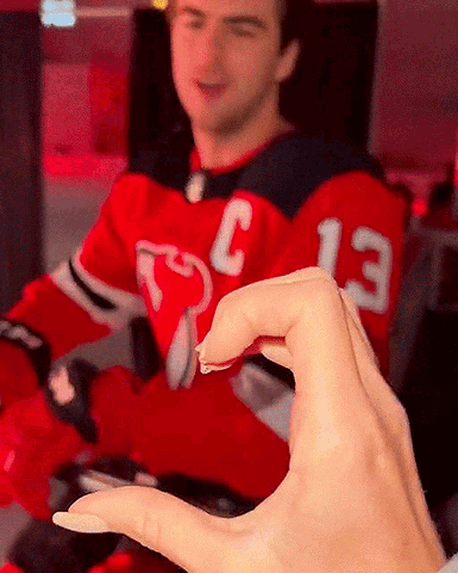 new-jersey-devils-heart-hand.gif