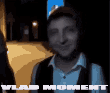 a blurred image of a man with vlad moment written on it