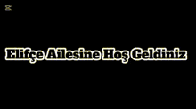 a sign that says ' elifce ailesine hos geldiniz ' on it