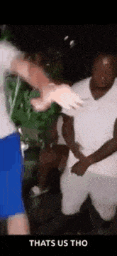 a group of people are standing next to each other .