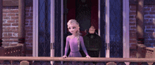 a woman in a purple dress is standing on a balcony next to a man in a suit