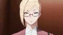a woman wearing glasses and a pink jacket looks at the camera