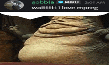 a picture of jabba the hutt with a caption that says i love mpreg