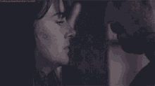 a close up of a man and woman kissing with the words lowkeyssebastianstan.tumblr visible in the corner