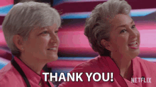 two women in pink shirts saying thank you on netflix
