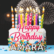 a birthday cake with candles and fireworks and the name amara on it