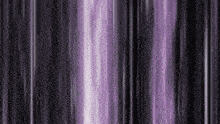 a purple and black striped background with a purple light coming out of it .