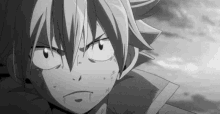 a black and white photo of a fairy tail character looking at the camera .