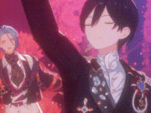 a couple of anime characters are standing next to each other on a stage with their arms outstretched .