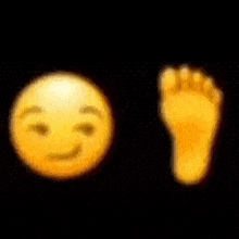 a blurred image of a smiley face and a foot .