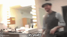 a blurry picture of a man with the words oh yeah written on the bottom