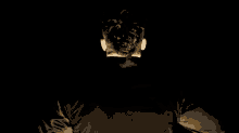 a close up of a person 's torso in a black and gold outfit