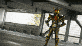 a man in a black and gold costume is standing in a parking lot