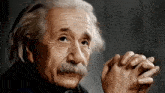 a painting of albert einstein with his hands folded in front of his face