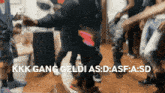 a group of people dancing with the words kkk gang geldi as : d : asf : a : sd below