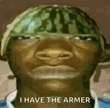 a man with a watermelon on his head and the words i have the armer