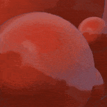 a bunch of red balloons floating in the air