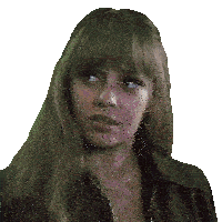 a close up of a woman 's face with a serious look on her face