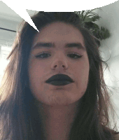 a woman with a beard and black lipstick looks at the camera