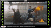 a movie screen shows captain america and thor in action