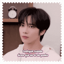a postage stamp with taehyun cuando dicen que no es de ponko written on it