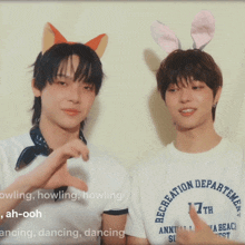 two boys wearing bunny ears and a shirt that says recreation department