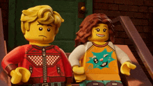 a boy and a girl are standing next to each other on the stairs