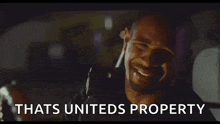 a man is crying in a car with the words `` that 's uniteds property '' .