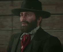 a man with a beard wears a top hat and tie